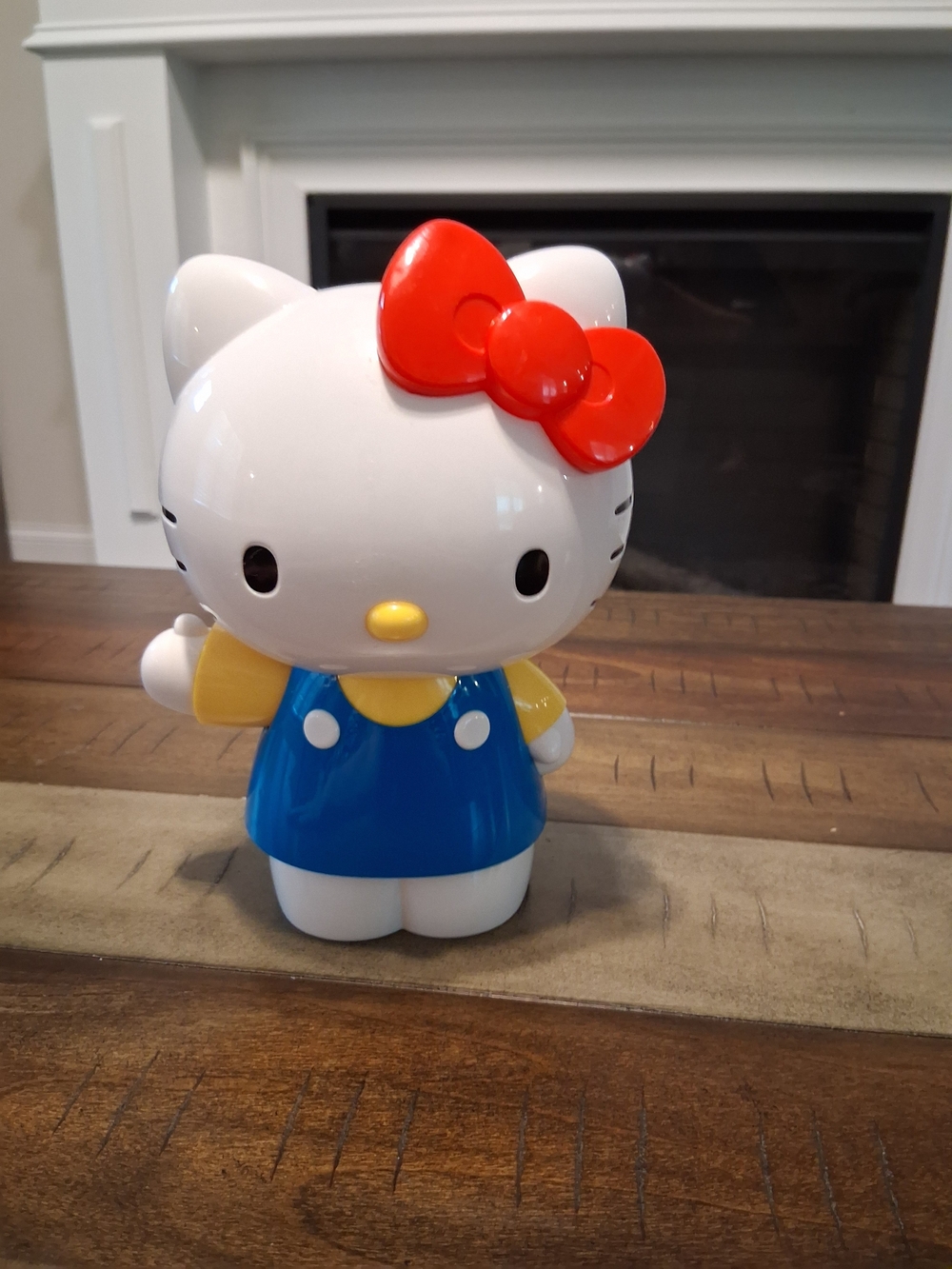 Hello Kitty Figure with Red Bow and Blue Outfit